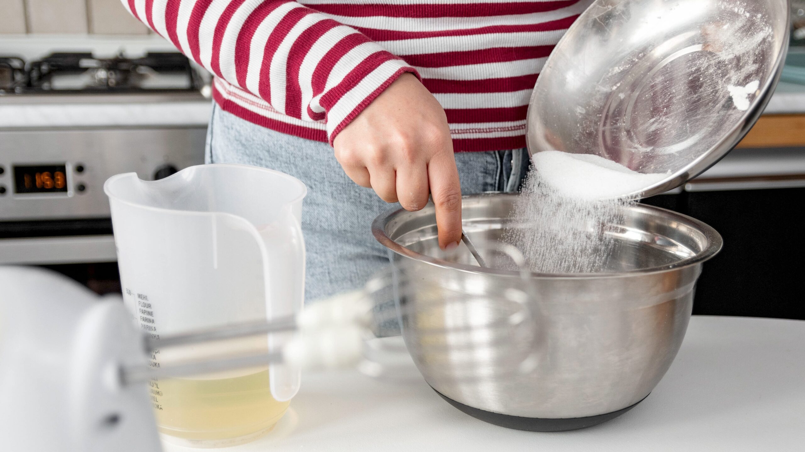 close up cropped image of woman mixing cake ingred 2022 11 14 19 28 37 utc edited scaled